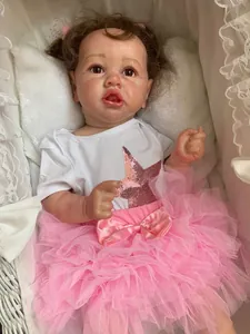 Macro detail of high-fidelity skin texture and pink star outfit on 55cm reborn doll