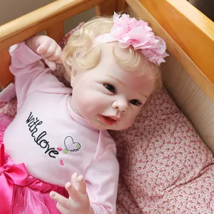 55CM lifelike reborn baby doll with blonde hair, pink floral headband and tutu skirt