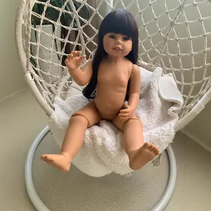 70cm realistic toddler mannequin doll with jointed body sitting in a white hanging chair