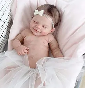 Macro detail of 22-inch reborn doll featuring realistic skin texture and a soft smile
