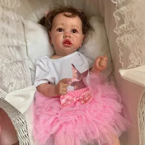 Lifelike 55cm silicone reborn toddler Saskia with brown curly hair in pink tutu outfit