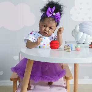 Poupée Saskia reborn toddler de 55cm avec tutu violet et corps en silicone souple