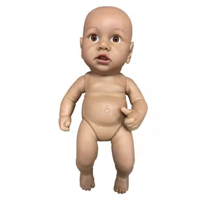 Realistic 12-inch reborn baby doll with deep brown eyes and lifelike skin texture