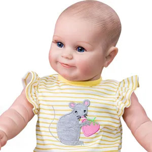 20 inch lifelike Reborn Maddie doll with blue eyes and yellow striped outfit on white background