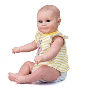 Lifelike 20-inch Reborn Maddie doll with blue eyes in yellow striped tank top