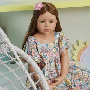Lifelike 98cm masterpiece reborn doll with brown curls and floral dress for collectors