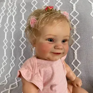 Realistic 60cm reborn toddler doll with blonde curls and pink floral headband