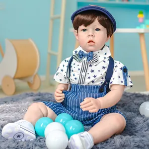 Realistic 70cm Reborn Toddler Liam doll wearing a blue striped outfit and hat