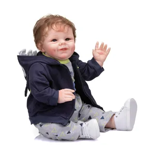 55cm lifelike reborn baby boy doll wearing a dinosaur hoodie and grey patterned trousers