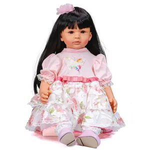 60cm realistic reborn toddler doll with long black hair and pink butterfly dress