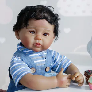 50cm African American reborn baby doll with curly hair wearing denim overalls