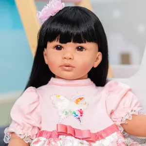 Realistic 60cm reborn toddler doll with long black hair in pink lace dress and floral headband