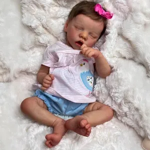 Realistic 18-inch sleeping reborn baby doll TwinA with pink bow and chicken embroidery