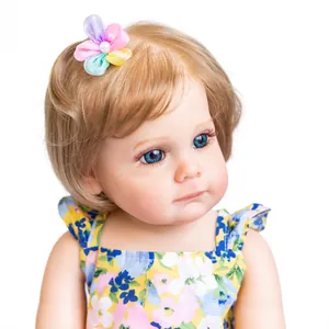 55cm lifelike silicone baby doll Maggi with blue eyes and yellow floral dress