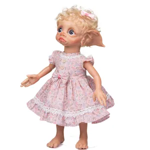 Delicate 40cm fantasy fairy doll with blue eyes and pink floral lace dress on white background