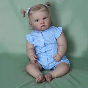 60cm reborn Charlotte baby doll with blonde curls and blue polka dot outfit