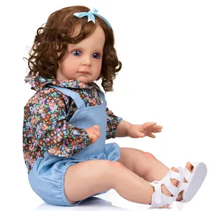 60cm realistic reborn toddler girl doll with brown curly hair and denim overalls