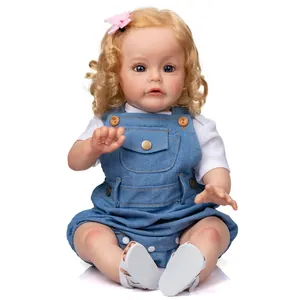 Lifelike 60cm reborn toddler doll with blonde curls, blue eyes, and denim overalls outfit