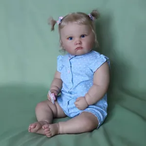 60cm Reborn Charlotte baby doll with blonde hair, blue eyes and blue polka dot outfit