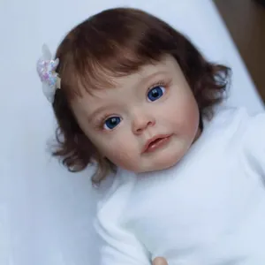 60cm Reborn Toddler doll SueSue with curly brown hair and sparkling blue eyes