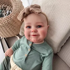 Lifelike 60cm reborn toddler doll Maddie with realistic skin texture and green outfit