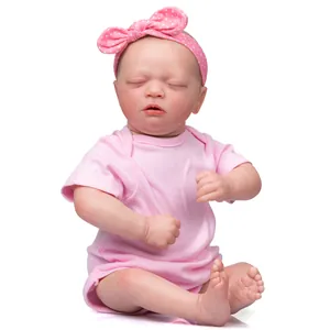 Poupée Reborn Skya 48cm réaliste en barboteuse rose avec yeux clos et peau douce