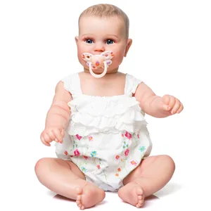 Poupée Maddie Reborn 50cm réaliste en barboteuse à dentelle fleurie avec sucette