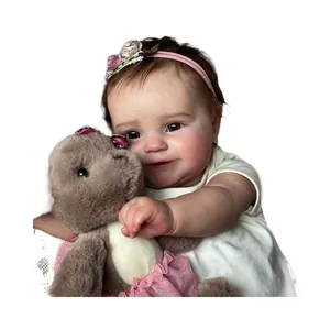 Poupée Reborn réaliste Maddie de 50cm avec bandeau floral et dinosaure en peluche