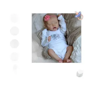 Poupée reborn réaliste de 18 pouces avec barboteuse éléphant blanche et bandeau à fleurs rose
