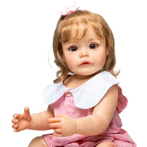 Close-up of lifelike baby doll featuring detailed facial expressions and pink bow