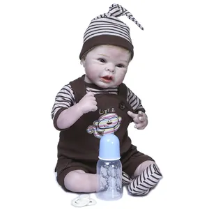 55cm lifelike reborn baby doll in monkey pattern overalls with bottle and pacifier