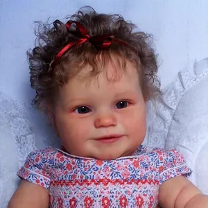 60cm realistic Reborn Toddler Maddie doll with curly hair and floral dress