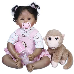 50cm African American reborn baby doll in pink dress with feeding bottle and pacifier