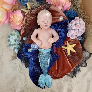 25 inch Rhynn Merbaby reborn doll kit with soft skin torso and blue fish tail design