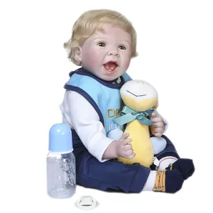 55cm lifelike blonde reborn boy doll with blue bib and plush dinosaur toy set