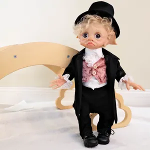 Lifelike 17-inch elf baby doll in formal tuxedo with top hat and curly blonde hair