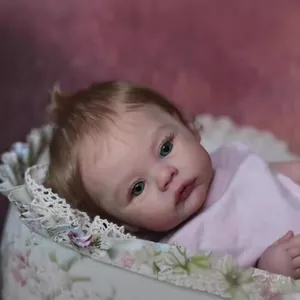18-inch realistic reborn baby doll with blonde hair, blue eyes and pink sleeveless top