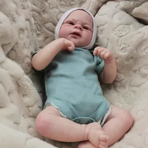 Realistic 49cm reborn baby doll Elijah with 3D hand-painted skin in green romper