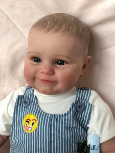 Close-up of a 60cm lifelike reborn baby boy doll with hand-painted hair and blue eyes