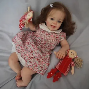 Realistic 60cm reborn doll with hand-painted veins, curly hair, and floral dress