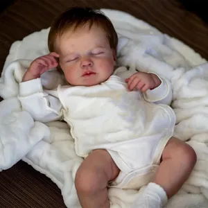 Detailed view of handmade lifelike reborn baby doll Loulou with realistic 3D skin texture