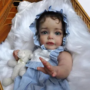 60cm realistic reborn baby doll Suesue with blue eyes and blue lace dress in basket