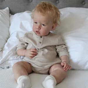 Realistic 75cm toddler boy doll Liam wearing a beige ribbed long-sleeved bodysuit