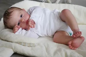 Close-up of realistic 60cm reborn baby doll Cameron with detailed 3D skin and veins