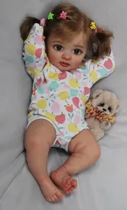 Detail of 45cm reborn doll with 3D skin veins and fruit pattern outfit with teddy bear