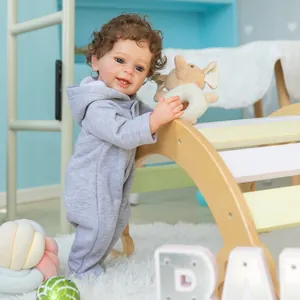 Lifelike 55cm baby boy Yannik reborn doll in grey hooded romper standing by ladder