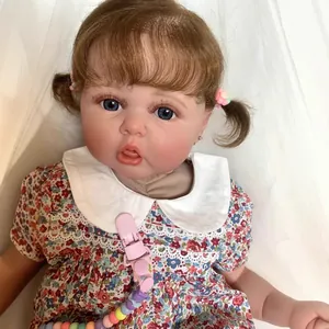 60cm realistic reborn baby doll with 3D skin veins and floral dress on white background