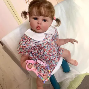 Realistic 60cm baby doll with blue eyes and floral dress, showing lifelike 3D skin texture