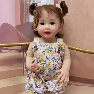 55cm full silicone reborn doll Teegan with floral romper and curly pigtails