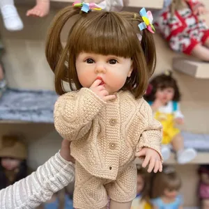 Realistic Lifelike Reborn Baby Doll Full Vinyl Silicone Body Toy With Brown Hair Knitted Cardigan And Shorts Outfit